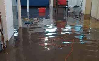 Basement with boiler, cabinets and washing machine completely flooded in Minneapolis, MN