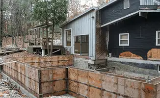 Prepared site with foundation forms for home remodeling and addition project in Minneapolis, MN